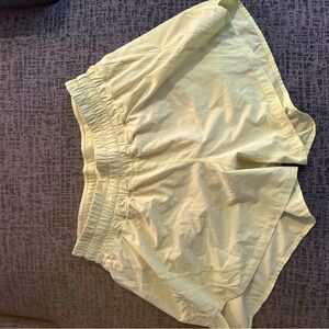 Light yellow lululemon shorts size 10